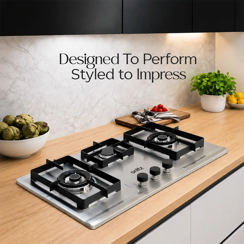 Snifz stainless steel built-in hob styled in a modern Pakistani kitchen countertop