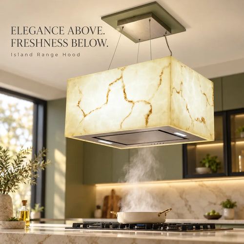 Snifz SZ-Cube 48 white marble island range hood installed above a gas hob in a modern kitchen