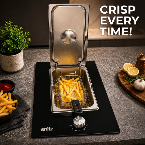 Snifz built-in electric deep fryer frying crispy fries in a modern kitchen countertop